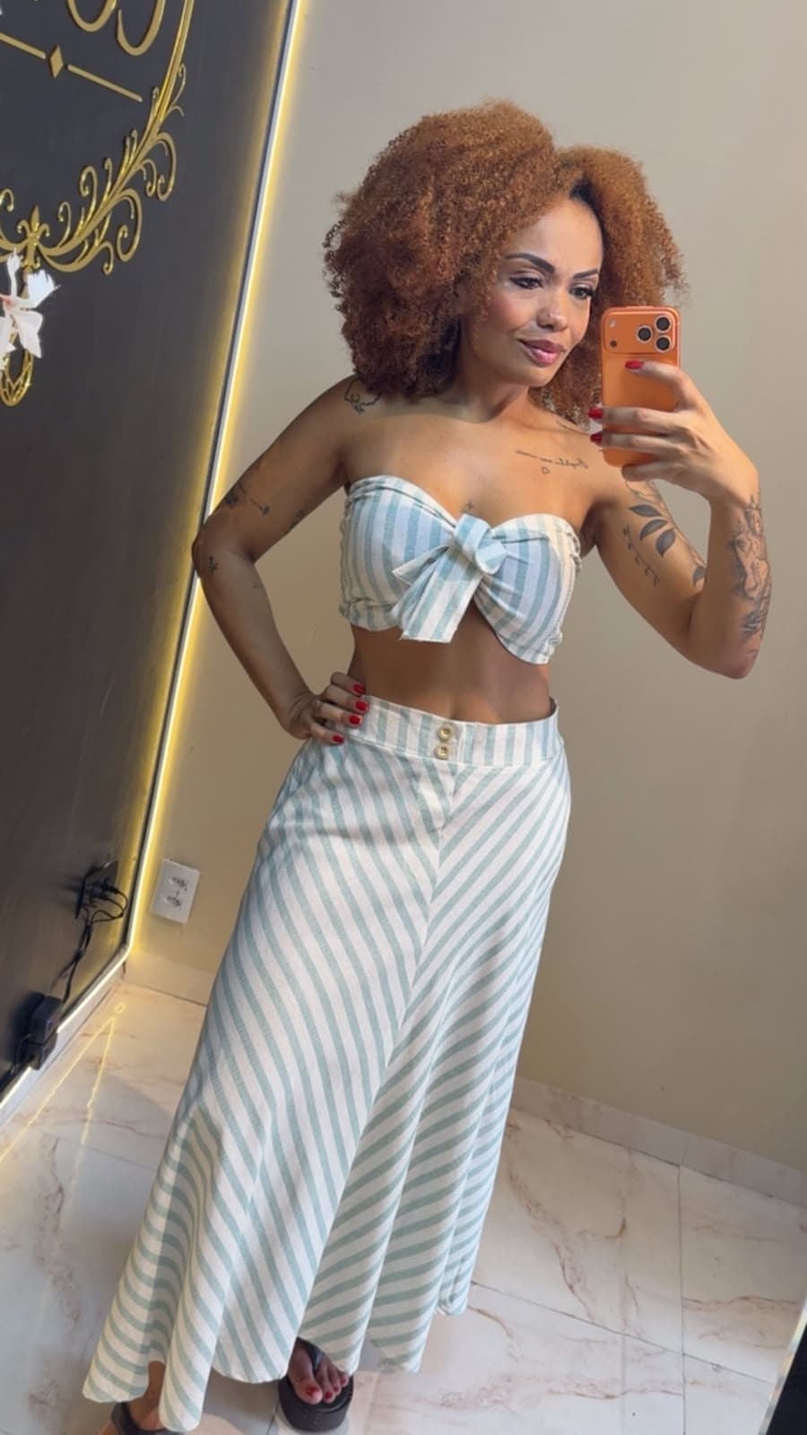 conjunto top e saia listrado, Mandita Cotê. Moda Feminina disponível na Mandita Cotê, Parque Edu Chaves